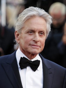 MAY 21, 2013 FILE PHOTO FILE - Actor Michael Douglas poses for photographers as he arrives for the screening of Behind the Candelabra at the 66th international film festival, in Cannes, southern France, in this May 21, 2013 file photo. The Guardian newspaper published an interview Monday June 3, 2013 in which Douglas blamed cunnilingus for the grave malady that was diagnosed in 2010. The newspaper also quoted doctors who were skeptical about his claim. (AP Photo/David Azia, File)