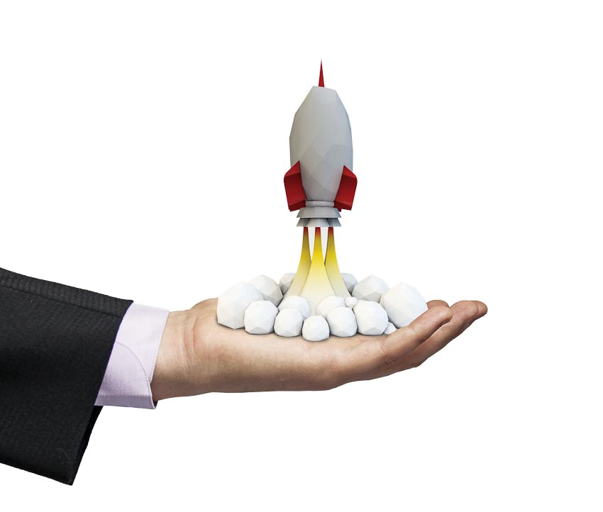 rocket launch over a businessman hand
