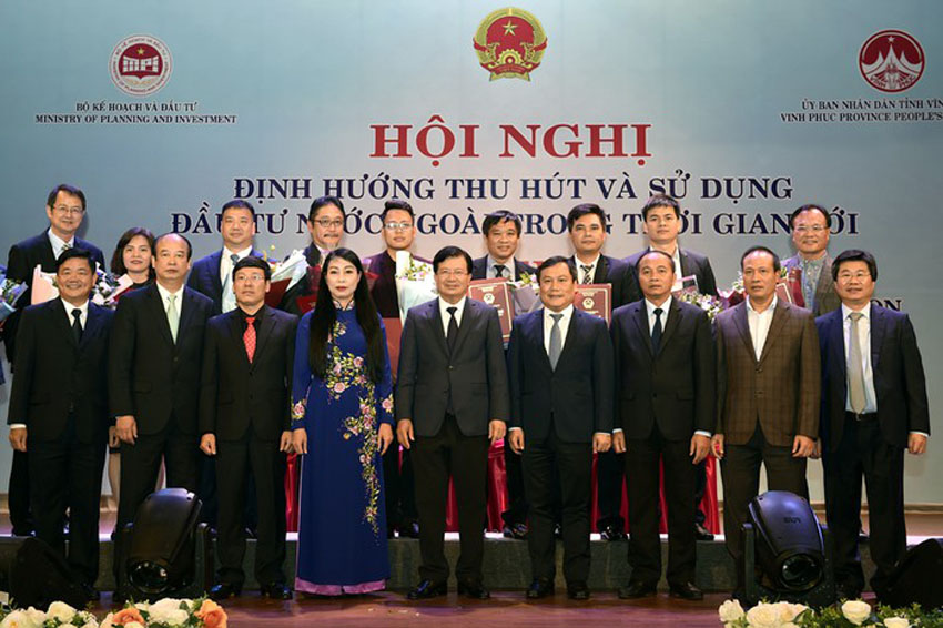 Phó Thủ tướng cùng các nhà đầu tư tại hội nghị. Ảnh: VGP/Nhật Bắc