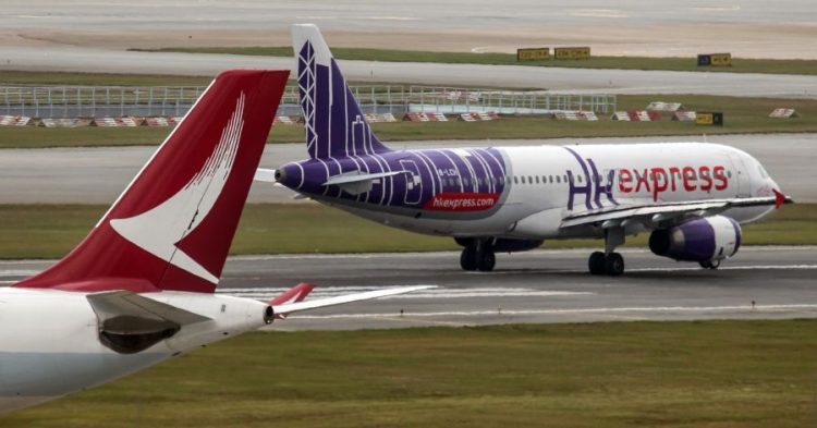 Cathay Pacific sẽ thâu tóm hãng hàng không giá rẻ HK Express - anh 1
