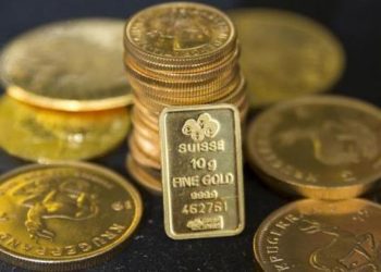 Giá vàng tăng do chứng khoán Mỹ giảm điểm. Ảnh: Reuters