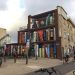 Nghệ sĩ đường phố biến một tòa nhà thành kệ sách kỳ vĩ ở Utrecht, Hà Lan - 1