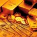 Giá vàng thế giới giảm trước sự đi lên của đồng USD và chứng khoán