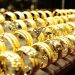 Giá vàng giảm do đồng USD mạnh và chứng khoán tăng điểm