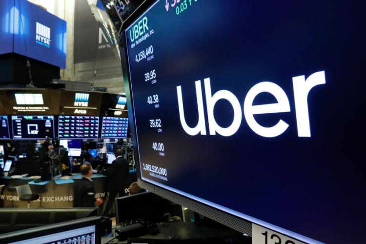 Uber lỗ hơn 5 tỉ USD trong 3 tháng - 1