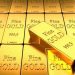 Đồng USD hạ nhiệt, vàng bật tăng mạnh