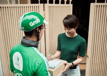 Shopee và Grab hợp tác triển khai dịch vụ “Giao hàng 1h” - 1