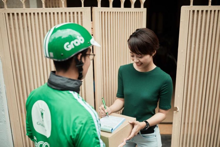 Shopee và Grab hợp tác triển khai dịch vụ “Giao hàng 1h” - 1