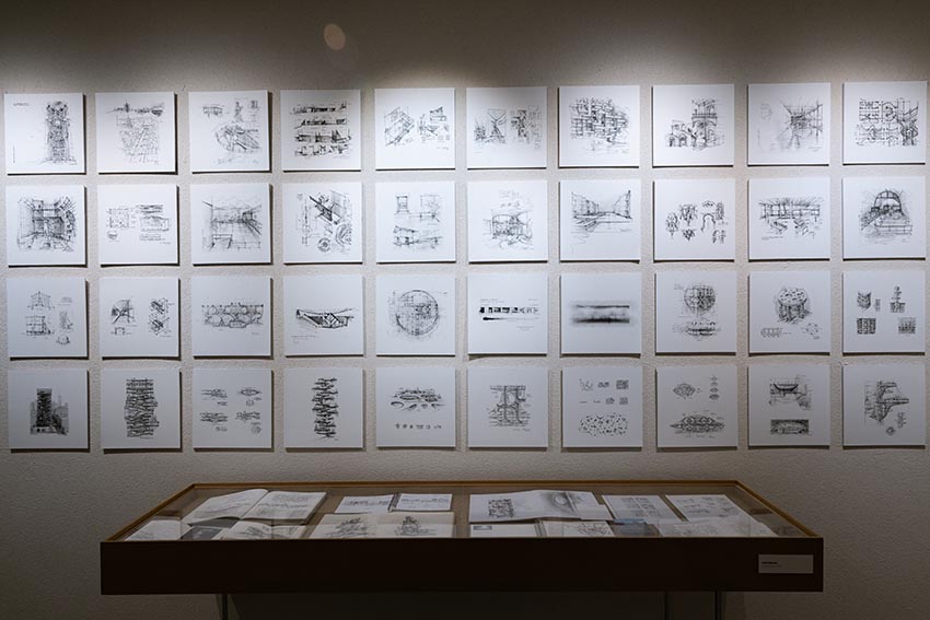 Mô hình kiến trúc trưng bày trong không gian triển lãm tối giản với ánh sáng dịu và bố cục tinh tế - 18